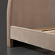Surya Elipse upholstered bed with a curved headboard, light brown cotton-polyester cover, and dark brown wood base.