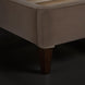 Surya Elipse upholstered bed with dark brown cotton and polyester fabric, and a dark brown stained wood leg.
