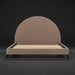 Surya Elipse upholstered bed with a large, curved headboard and dark brown fabric.