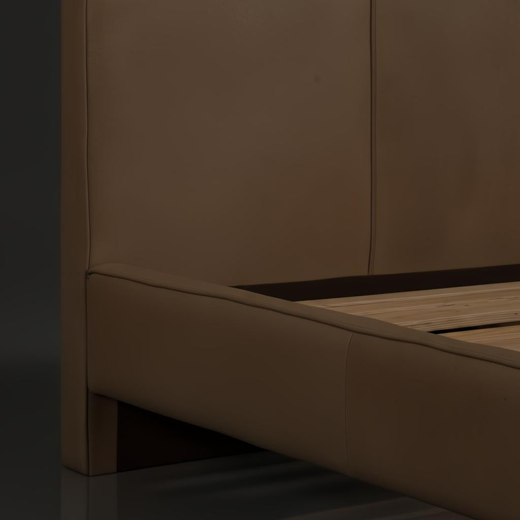 Surya Elipse King upholstered bed with dark brown aniline dyed leather and wood base.