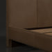 Surya Elipse King upholstered bed with dark brown aniline dyed leather and wood base.