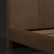 Surya Elipse King upholstered bed with dark brown aniline dyed leather and wood base.