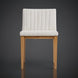 Surya Joanne dining chair with off-white polyester upholstery, vertical channel tufting, and a wheat rubber wood base.