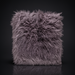 Surya Kharaa Throw, a plush, shaggy purple-grey faux fur blanket with a soft, woven texture.