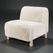 Fluffy off-white accent chair with a soft upholstered look and light brown rubber wood base.