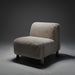 Off-white polyester accent chair with a soft, textured look and light brown rubber wood legs.