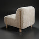 Off-white polyester accent chair with a plush, textured upholstery and light brown rubber wood legs.