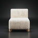 Off-white polyester accent chair with a soft, textured look and light brown rubber wood base.