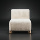 Off-white polyester accent chair with a soft, textured look and light brown rubber wood base.