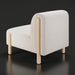 White Surya Kenwood accent chair with 100% polyester upholstery and light brown rubber wood legs.