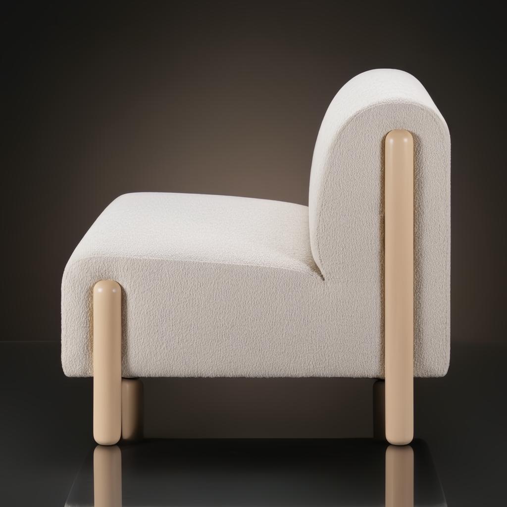 Surya Kenwood accent chair with white polyester upholstery and light brown rubber wood legs.