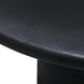 Close-up of a black brushed mango wood dining table with visible wood grain and a turned base.
