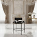 Surya Kornel Counter Stool with black iron frame and cowhide-patterned seat, 24"H.