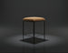 Surya Kornel counter stool with a tan polyester seat and black powder-coated iron base, rustic industrial style.