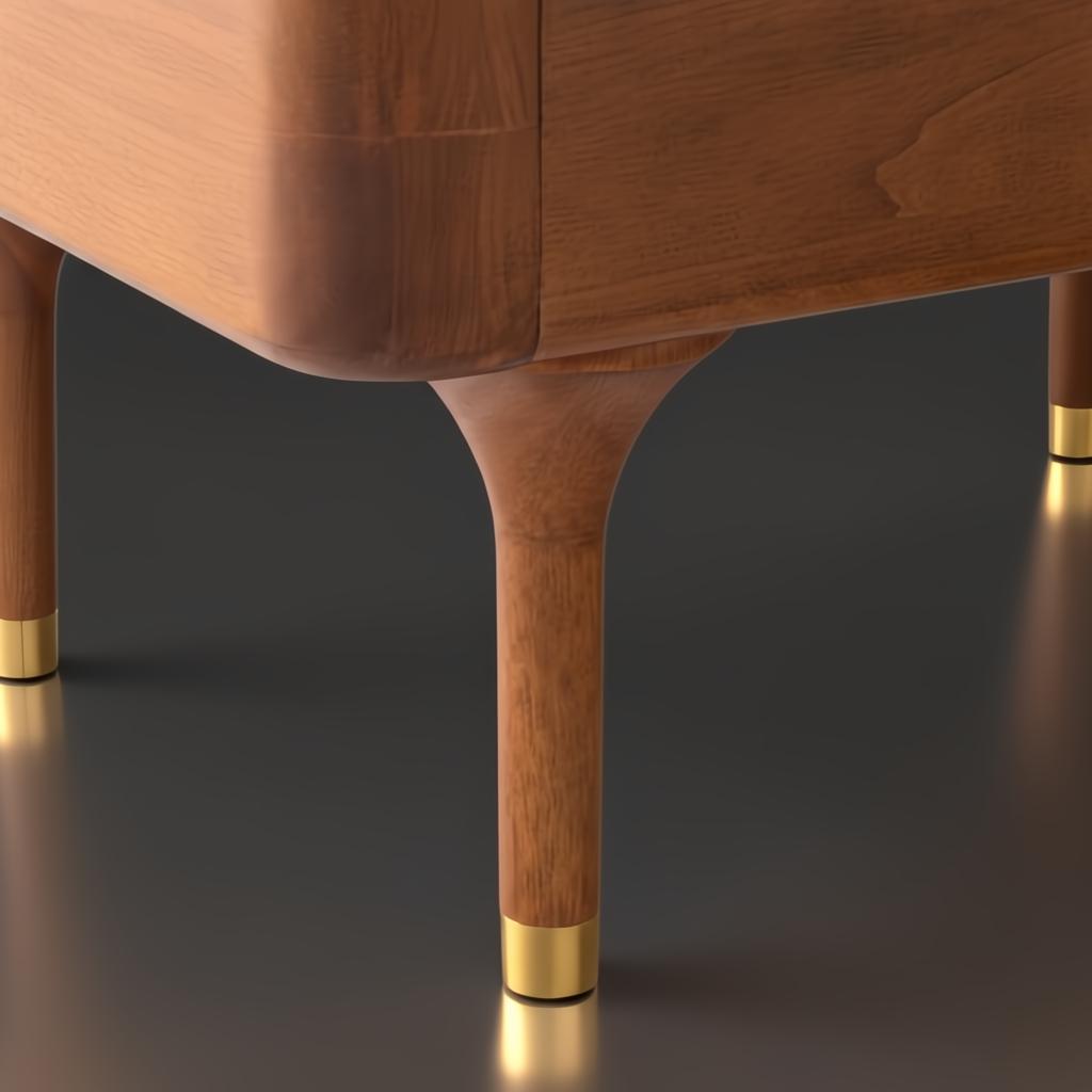 Close-up of a Surya Madri wood bed leg, featuring brown stained poplar with a minimalist modern design and brass cap.