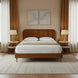Surya Madri brown stained poplar wood bed with a minimalist modern design in a bedroom setting.