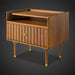 Brown Madri nightstand with a minimalist modern design, poplar top, fluted drawer, and brass-capped legs.