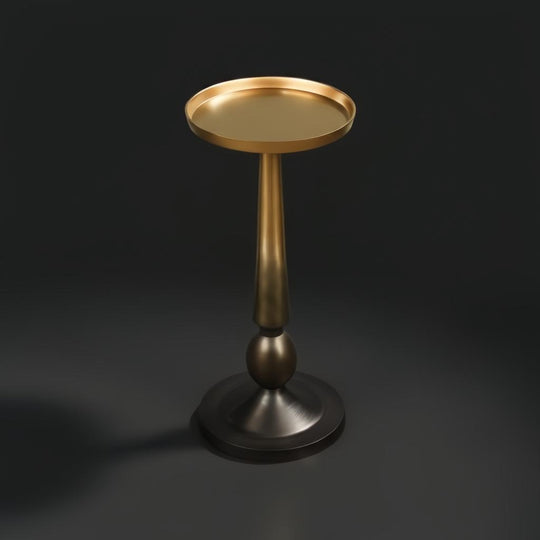 Surya Molino gold aluminum end table with a round top and tapered pedestal base.