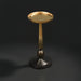Surya Molino gold aluminum end table with a round top and tapered pedestal base.