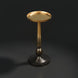 Surya Molino gold aluminum end table with a round top and tapered pedestal base.