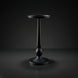 Black aluminum Surya Molino end table with a round top, slender pedestal, and circular base.
