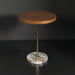 Surya Nano End Table with round brown brushed oak veneer top, brass stem, and beige natural marble base.