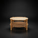 Surya Orly round mango wood coffee table with a wheat brown base and woven paper rope shelf.