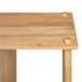 Close-up of a light brown mango wood cabinet top with two round wooden pegs.
