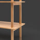 Brown mango wood bookcase with clean lines and wide shelves for storage and display.