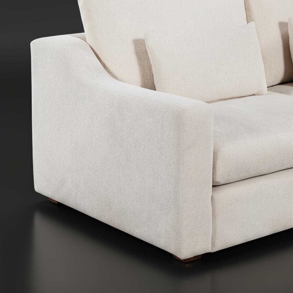 Close-up of a light brown fabric left arm of the Surya Pedersen sectional sofa.