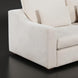Close-up of a light brown fabric left arm of the Surya Pedersen sectional sofa.