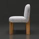 Surya Pico Dining Chair with taupe polyester-linen upholstery and brown rubber wood base, side view.