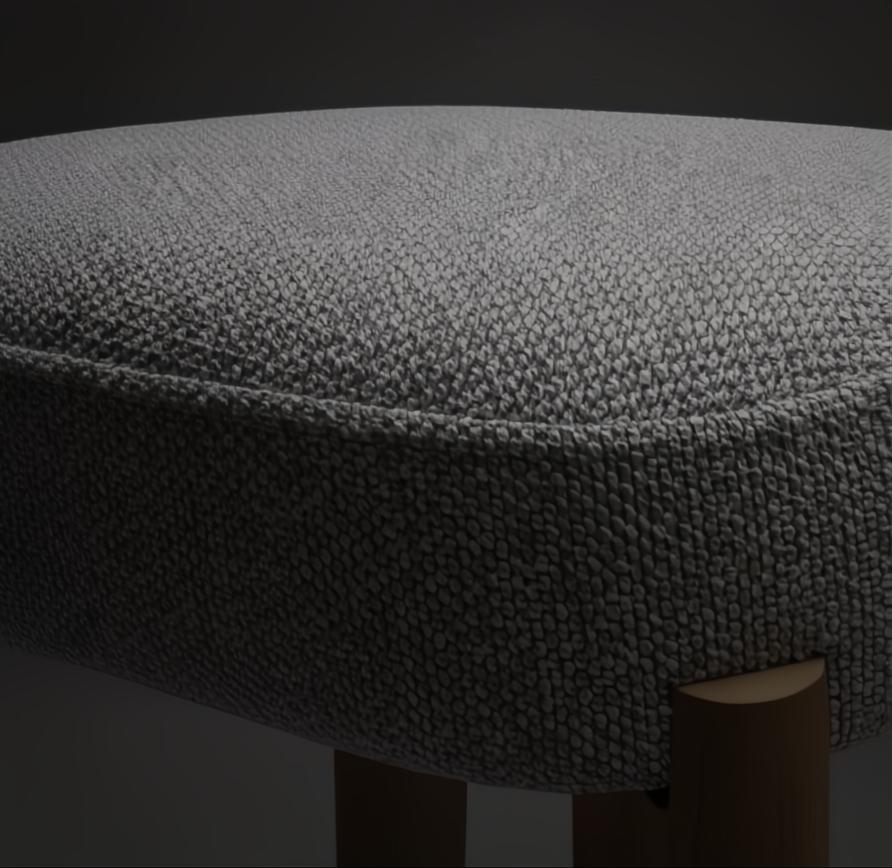 Close-up of a Surya Pico Dining Chair seat, showing taupe polyester and linen fabric upholstery with a textured weave and a glimpse of the brown rubber wood base.