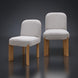 Set of two Surya Pico dining chairs with taupe polyester-linen upholstery and brown rubber wood bases.
