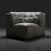 Surya Oryan RYAN-006 black leather modular sofa with tufted back and pine base.