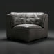 Surya Oryan RYAN-006 black leather modular sofa with tufted back and pine base.
