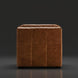 Surya Oryan modular sofa in brown leather with a black rubber wood base, featuring a tufted design.