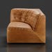 Surya Oryan modular sofa in brown leather with tufted back and seat.