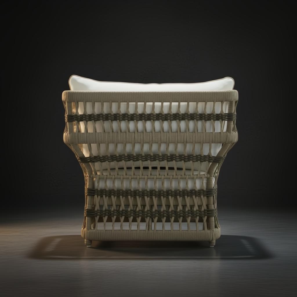 Cream Surya Winder accent chair with woven frame, Sunbrella cushions, and quick-dry foam.